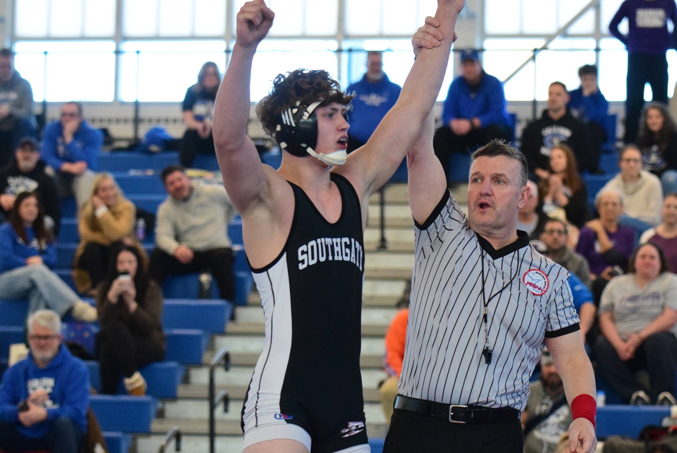 Anderson freshman Liam McMillen celebrates after winning the 175-pound individual title at the Downriver League wrestling championships on Feb 7, 2026. (ALEXANDER MULLER -- MediaNews Group)