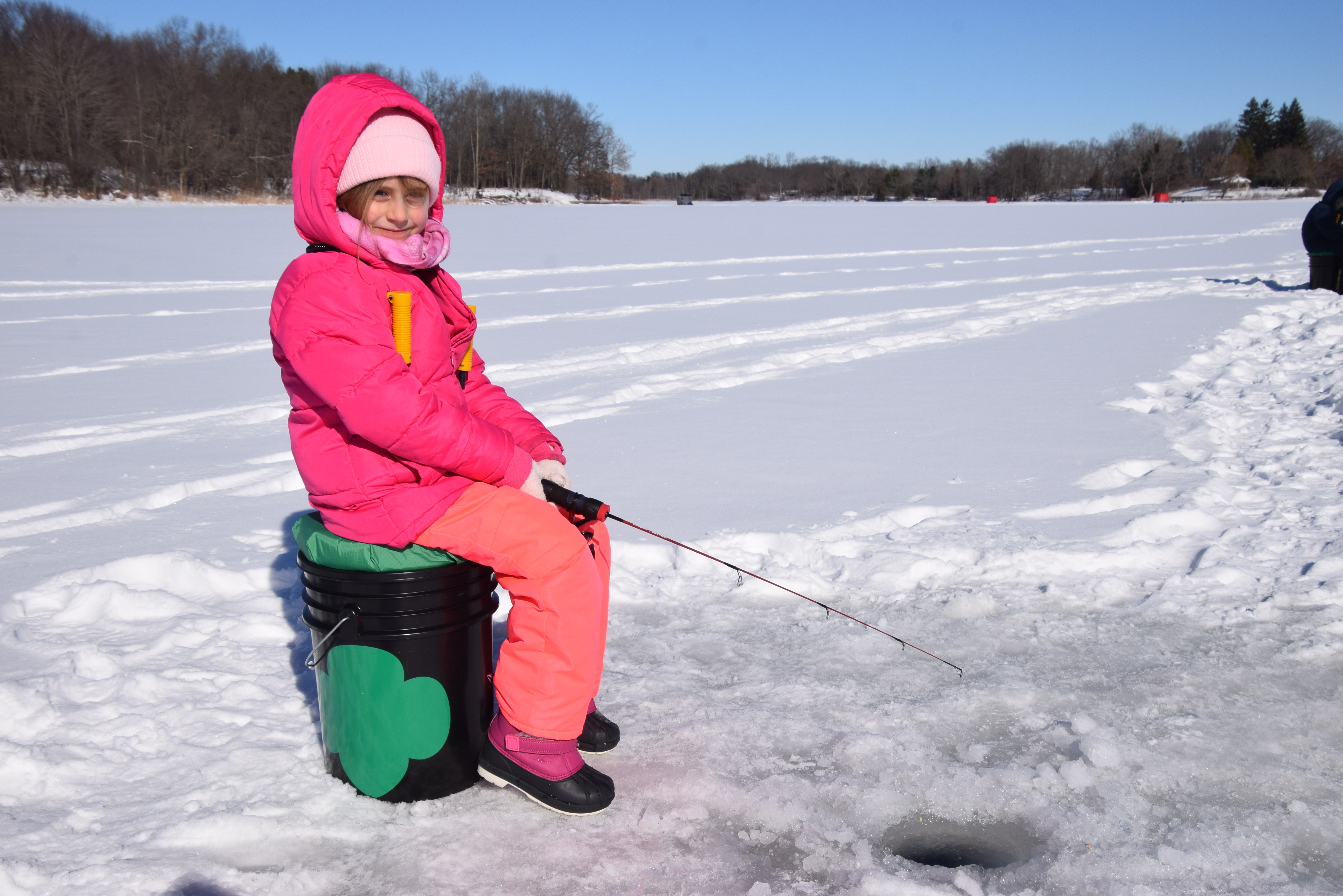 Rylee Demyanovich, a first grader from Southgate, takes a seat for the Scouts’ Ice to Table – Ice Fishing program on Feb. 1. (Photo courtesy of Girl Scouts of Southeastern Michigan)
